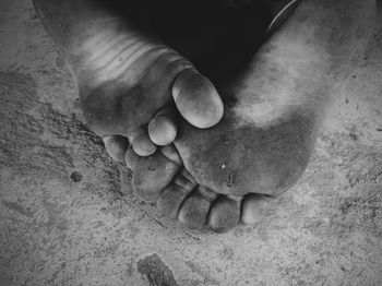 Low section of man on sand