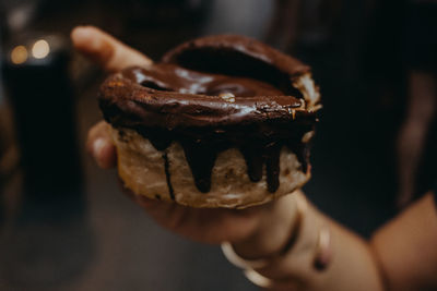 Close-up of hand holding ice cream