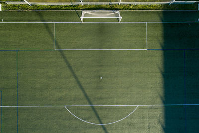 Overhead view from a drone of the goal of a soccer field