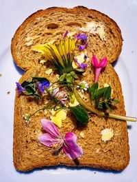 High angle view of purple flower on table