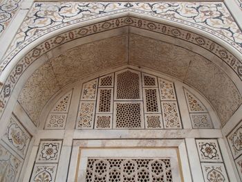 Low angle view of ornate ceiling in historic building