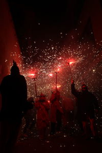 Correfoc parties, typical with firecrackers and lights in the towns