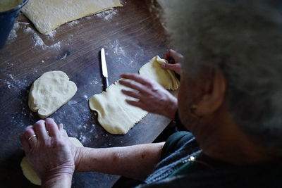 Midsection of woman preparing food