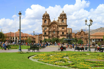 The belfry of cathedral basilica of the assumption of the virgin against sunny sky, cusco, peru