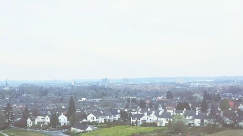 View of cityscape against clear sky