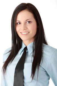 Portrait of a smiling young woman over white background