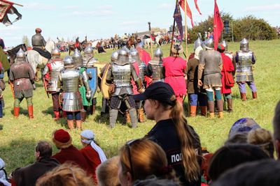 People on field against sky