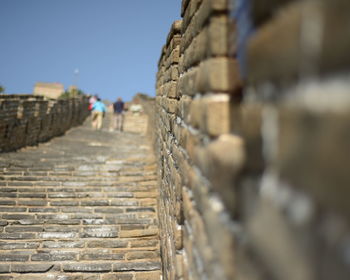 Pathway at great wall of china against sky