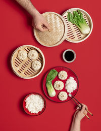 High angle view of person preparing food on table