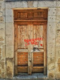 Text on door at entrance of building