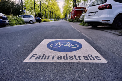 Road sign on street in city