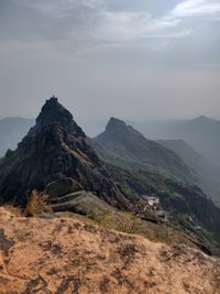 Scenic view of rocky mountains against sky