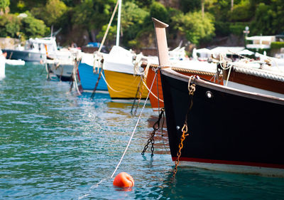 Fishing boats moored in sea