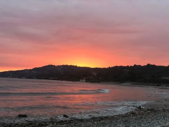 Scenic view of sea against sky during sunset