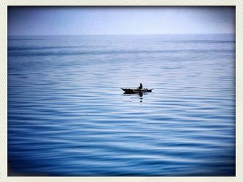 Boat sailing in sea