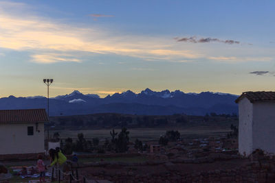 Scenic view of mountains against sky during sunset