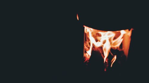 Close-up of fire in the dark