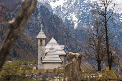 House on snowcapped mountain