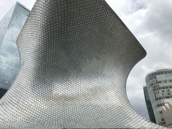 Low angle view of modern building against sky