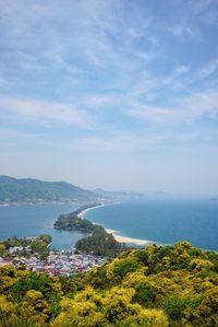 Three views of japan. scenic view of bay against sky