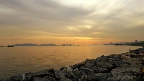 Scenic view of sea against sky during sunset