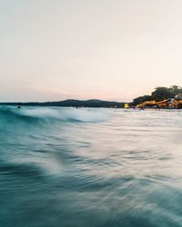 Scenic view of sea against sky at sunset