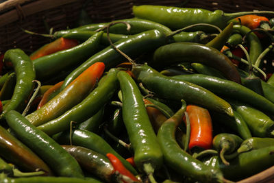 Close-up of green chili peppers for sale in market