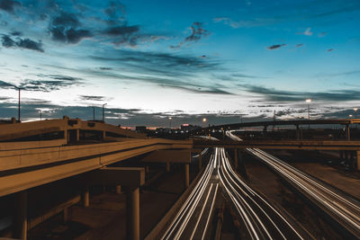 High angle view of railway tracks at night