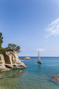 Boat sailing in sea