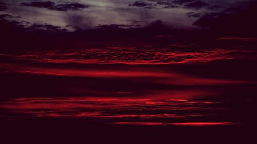 Low angle view of dramatic sky at sunset