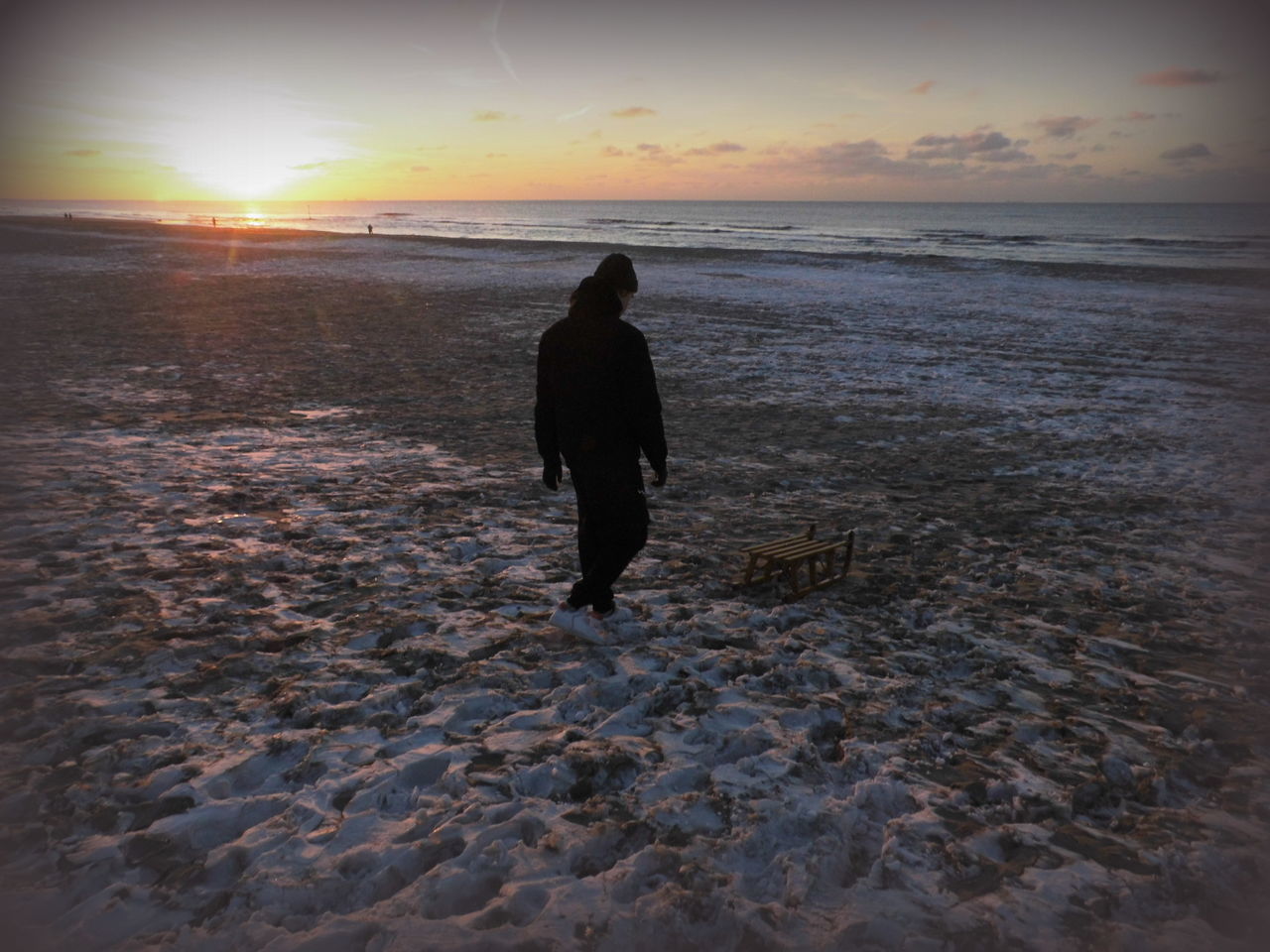 SILHOUETTE MAN ON BEACH DURING SUNSET