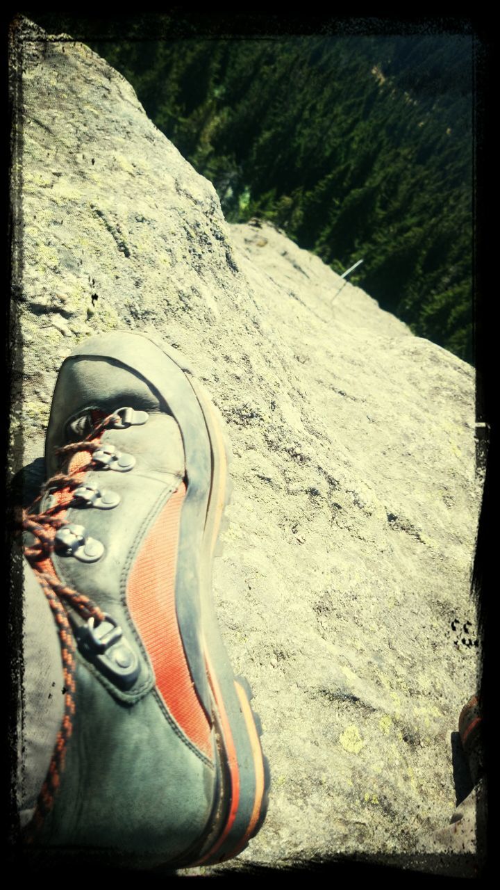 transfer print, auto post production filter, shoe, low section, person, footwear, sand, close-up, part of, outdoors, day, pair, sunlight, personal perspective, human foot, high angle view, canvas shoe, one person, shadow