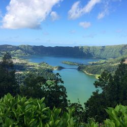 Lake and mountains at sao miguel against sky