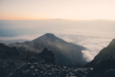 Scenic view of mountains against sky during sunset