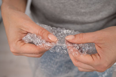 Close-up of woman holding hands