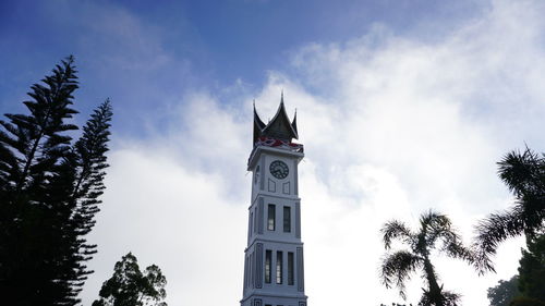 Low angle view of bell tower against sky