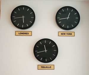 Close-up of clock on wall