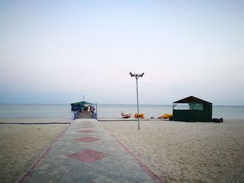 Scenic view of beach against clear sky