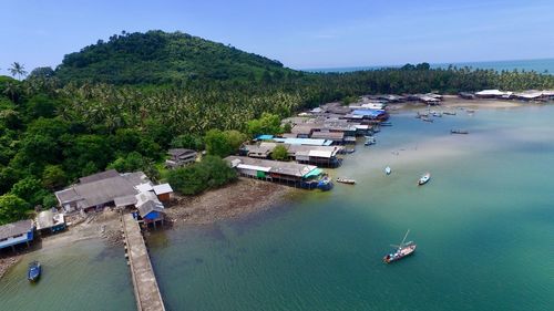 High angle view of boats in river against sky