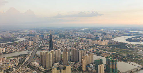 High angle view of city buildings during sunset