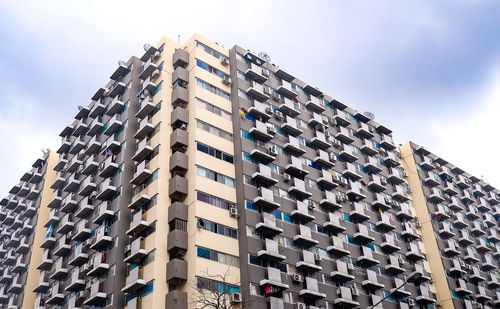 Low angle view of modern building against sky