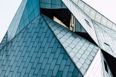 Low angle view of modern building against clear sky