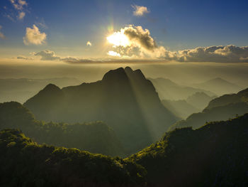 Scenic view of mountains against sky during sunset