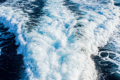 Close-up of water splashing in swimming pool