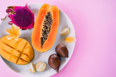 High angle view of fruits in plate on table