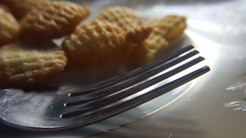 Close-up of bread in plate on table