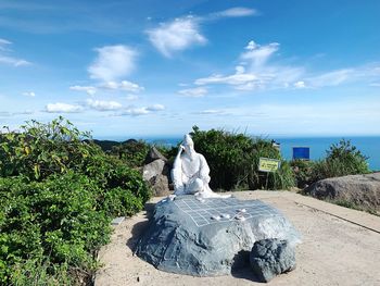 Scenic view of rock against sky