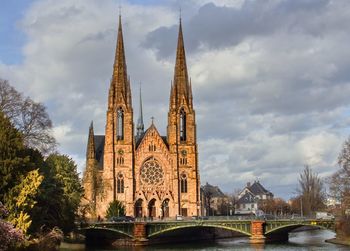 Cathedral in strasbourg against cloudy sky