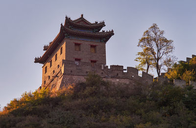 Low angle view of historic building against sky