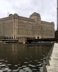 View of river with buildings in background